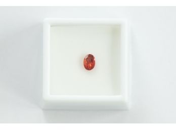 Approximately .45CT 7x5MM Oval Red Labradorite