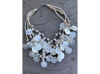 Four Strand Statement Necklace With Opalescent Shell Charm Details