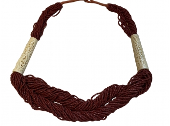 Beautiful Multi Strand Statement Necklace With Woven Cord & Heavy Carved Bone Accents