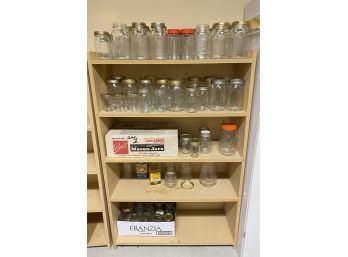 Shelf With Large Lot Of Canning Jars