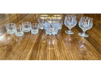 Collection Of Sake Glasses, Rocks Glasses And Baileys Coups