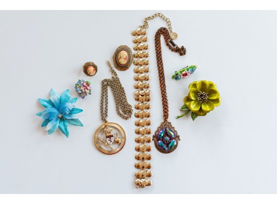 A Nice Grouping Of Vintage Costume Jewelry Pieces Including Enamel Pins And Faux Cameos