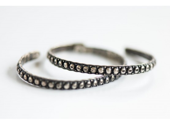 A Nice Group Of Two Sterling Silver Bangles With Beaded Design