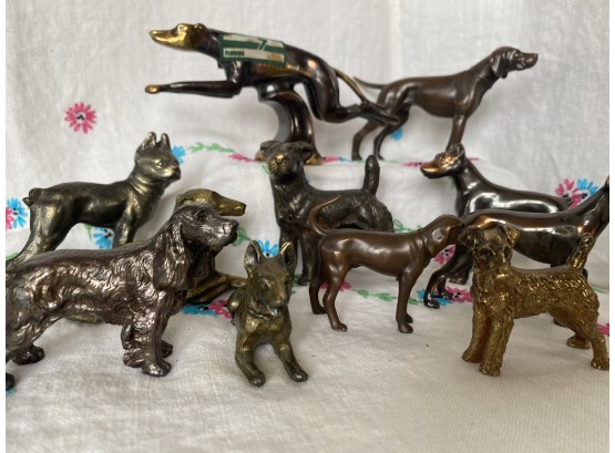 A Grouping Of Collectible Cast Metal Dog Figurines Including Racing Florida Greyhound From 1948