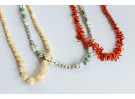 A Trio Of Necklaces Made Of Natural Elements Including Bone And Coral