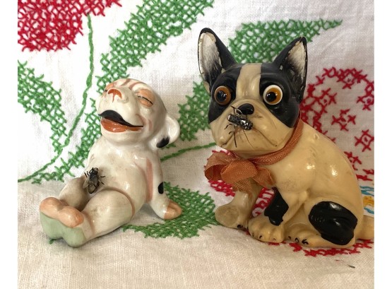 Two Novelty Dog Figurines With Metallic Fly Detail