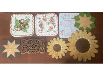A Wonderful Grouping Of Trivets Including Carved Wood Trivet With Grape Leaf Detail