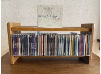 Collection Of CDs And CD Stand