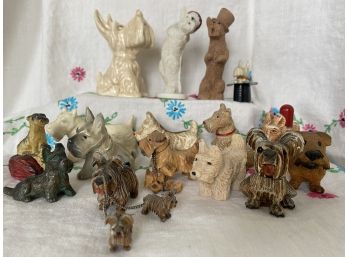 A Huge Grouping Of Scottie Dog Miniatures And Souvenir Pieces In A Variety Of Mediums Including Wood & Resin