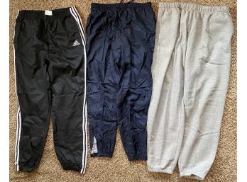Grouping Of 3 Mens Large Athletic Windbreaker/ Sweatpants Including Adidas Three Stripe
