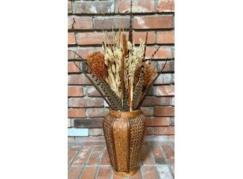 Wicker Vase With Natural Plants And Feathers