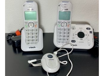 Two Vtech Phones With Attachment And Docking Stations