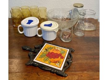 Misc. Kitchen Items Including Corningware, Tile Trivet, Amber Drinking Glasses, Large Glass Bowl, And More