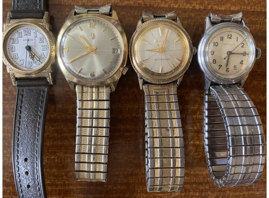 A Grouping Of Men's Vintage & Antique Watches Including Gold Plate By Movada, Longines And Bulova