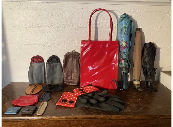 Collection Of Umbrellas, Coin Purses And Red Vinyl Bag