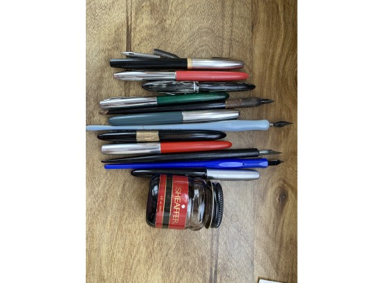 A Collection Of Fountain & Calligraphy Pens With Shaeffer Ink Bottle