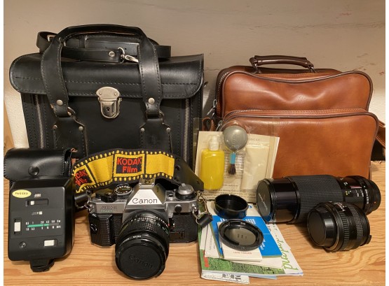 Huge Lot Of Camera Gear Including Canon AE-1 Film Camera, Lenses, Camera Straps, Lens Filters, Bags & More!