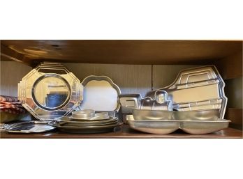 A Nice Collection Of Metal Bakeware Including 1970s Wilton Cake Molds And Spring Release Pie Pans