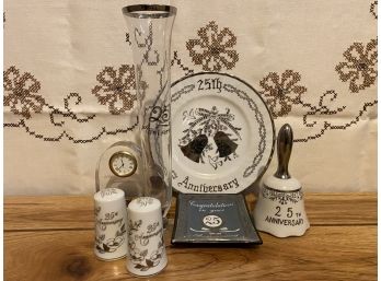 A Grouping Of Anniversary Themed Porcelain Pieces
