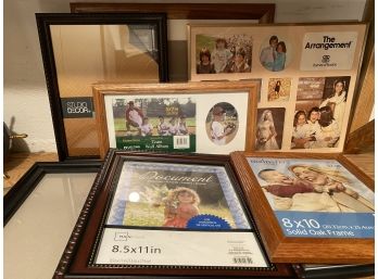 A Grouping Of Mostly New Picture Frames