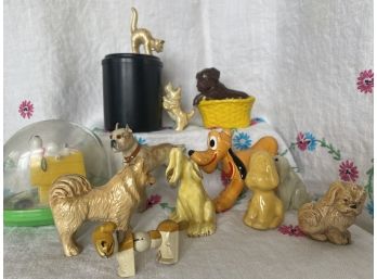 Yellow Themed Collection Of Canine Miniatures Including Snoopy, Pluto, And Tobacco Or Tea Tin With Cast Iron
