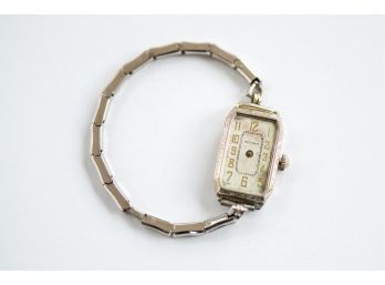 A Beautiful Antique Gold Watch By Waltham