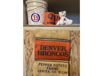 A Fun Grouping Of Vintage Broncos Decor Including Burlap Potato Sack
