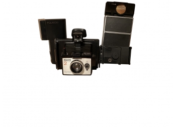 A GREAT Grouping Of Polaroid Cameras And Flash Attachments Including Square Shooter 2 And SX-70