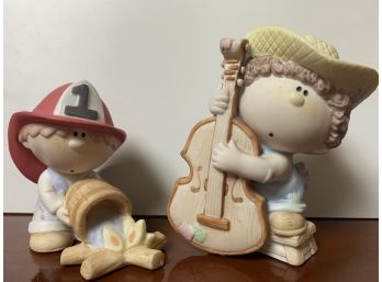 Pair Of Two Bumpkins By Fabrizio Porcelain Figurines Including Firefighter & Upright Bass Player
