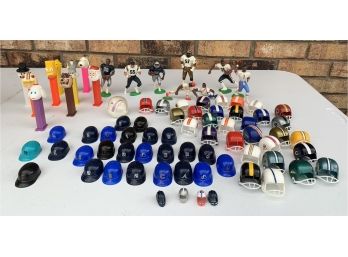 Collection Of Vintage NFL Helmets, Baseball, And A Variety  Of Pez Dispensers