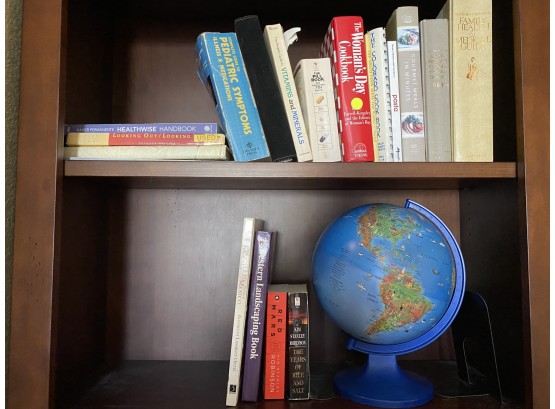 Grouping Of Books And One Plastic Globe