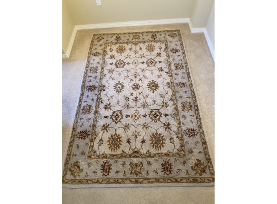 A Nice Small Wool Area Rug With Blue, Cream And Brown Color Scheme