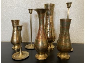 An Awesome Collection Of Mid Century Tooled Brass Vases And Taper Candle Holders
