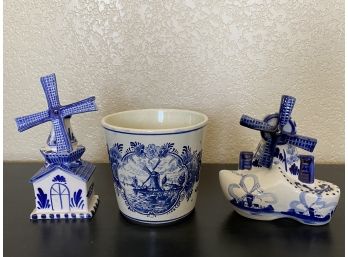 A Nice Grouping Of Delft Pottery Pieces Including Two Windmills And One Small Planter