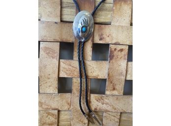 A Lovely Shadowbox Bear Claw Men's Bolo Tie On Leather Strap