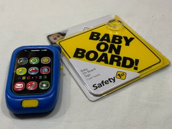 Baby On Board Sign (new),  Baby Toy (used)