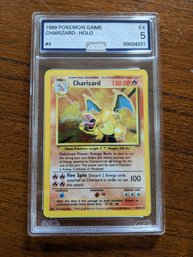 1999 Pokemon Game Charizard Holo #4 - AGS Graded 5