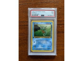 1999 Pokemon Card Fossil Horsea #49 1st Edition - PSA 7