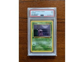 1999 Pokemon Card Fossil Grimer #48 1st Edition - PSA 7