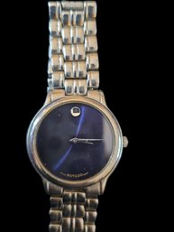 Vintage Authentic Silver Tone Movado Water-resistant, Stainless Steel Band And Back,  Quartz Crystal Face