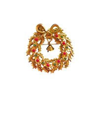 Vintage Costume Jewelry Gold Tone Wreath Brooch With Bell Tassel Charm And Red Cabochon Balls And Green Rhines