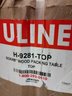 Uline Packing Table  48 X 60 Full Lower Shelf & Stringer Legs & Composite Wood Top New In Box (Lot 1 Of 2)