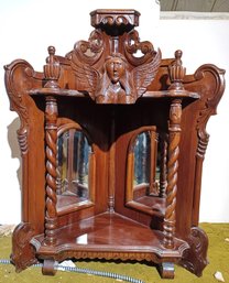 Gothic Revival Antique Carved Wood Winged Angel Corner Cabinet With Mirrors