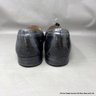 Two Pairs Of Men's Leather Loafers, Bally And Salvatore Ferragamo