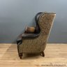 Thomasville Wing Back Leather Chair With Brass Tack Detail And Animal Print On Back (LOCAL PICK UP ONLY)