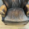 Thomasville Wing Back Leather Chair With Brass Tack Detail And Animal Print On Back (LOCAL PICK UP ONLY)