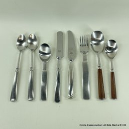 Eight Assorted Oneida And Unmarked Stainless Steel And Wood Handled Flatware Pieces