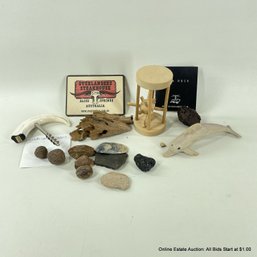 Assorted Wood And Stone Knick Knacks Including Logic Puzzle, Whittled Dolphin, And Lava Rock