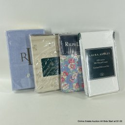 Four Pairs Of Assorted Ralph Lauren And Laura Ashley Standard Pillowcases In Original Packaging