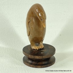 Carved Horn Penguin On Wood Stand 2.25'